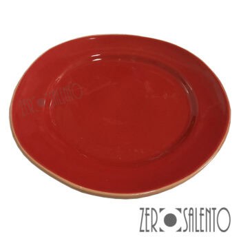 Piatto piano "DEFORME' " in Terracotta con bordo irregolare Rosso